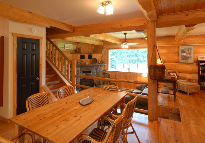 Wooden dinning table inside log house